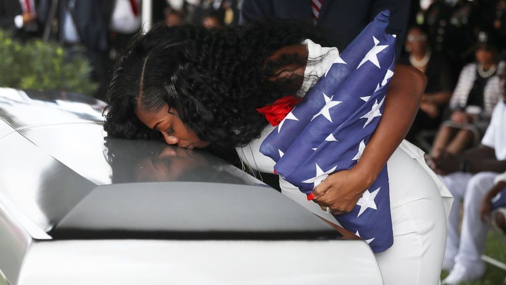 98443941_gettyimages-864710270-1.jpg Widow of dead soldier hits out at Trump