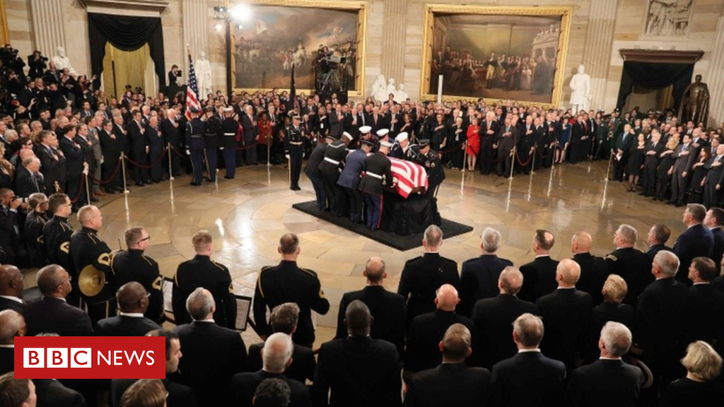 104604772_050976617-1.jpg President Bush lies in state at US Capitol