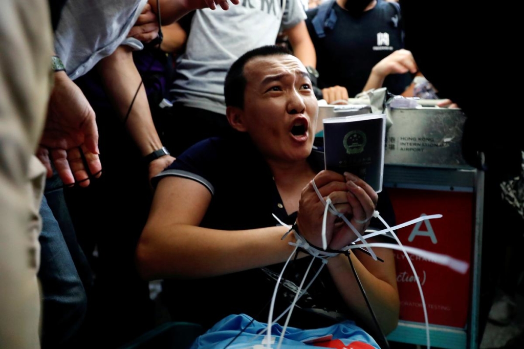 Chinese state media urge action, voice support for Hong Kong police after overnight clashes