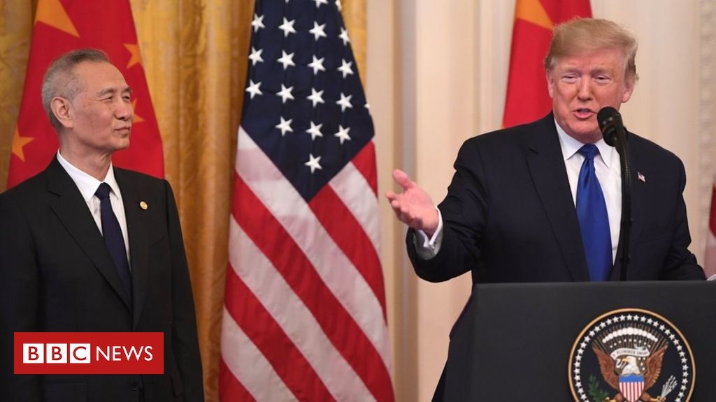 US and China sign deal to ease trade war