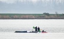Rescuers to use air cushions in latest effort to save stranded whale rescuers-to-use-air-cushions-in-latest-effort-to-save-stranded-whale